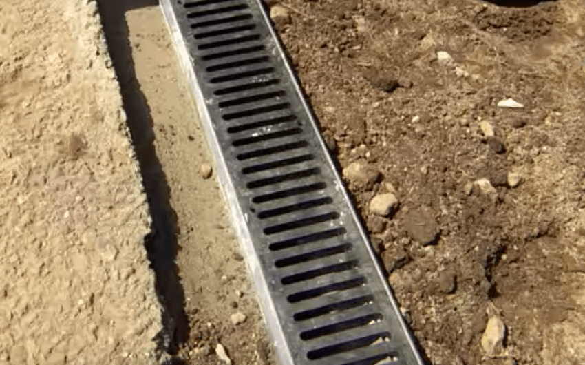 Lay-the-drain-Drainage-Solutions-How-to-install-garden-drainage-guide